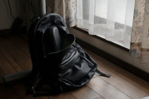 An empty rucksack on the floor