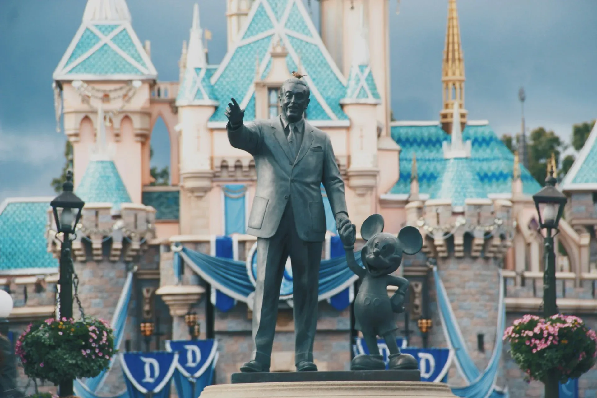 A statue of Walt Disney and Mickey Mouse