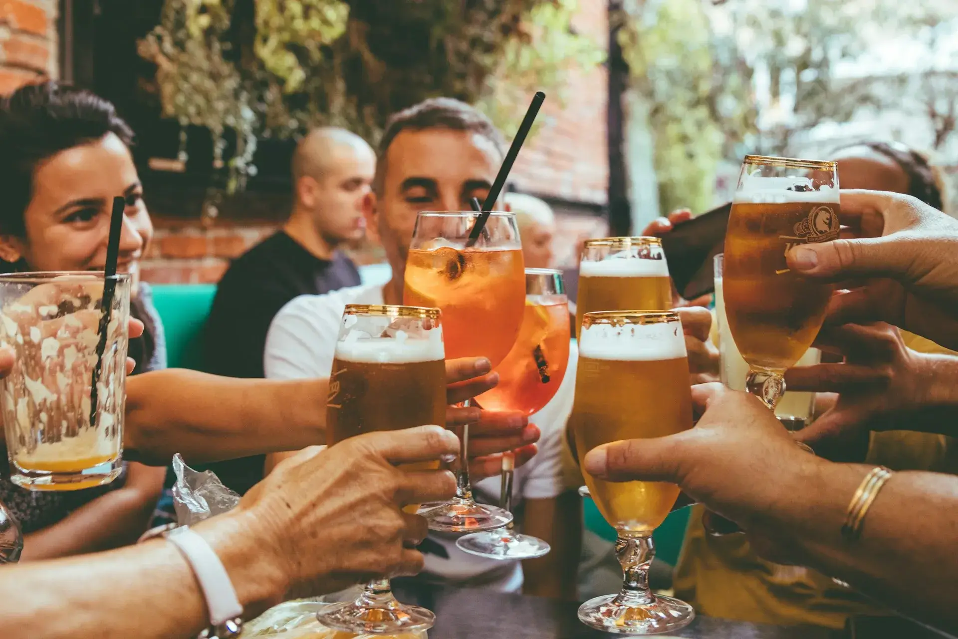 A group of people toasting drinks on a bank holiday